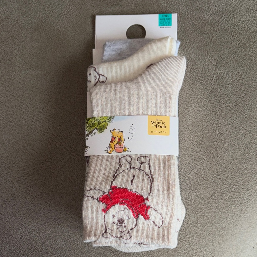 Disney Winnie the Pooh women’s Cream and Red Socks